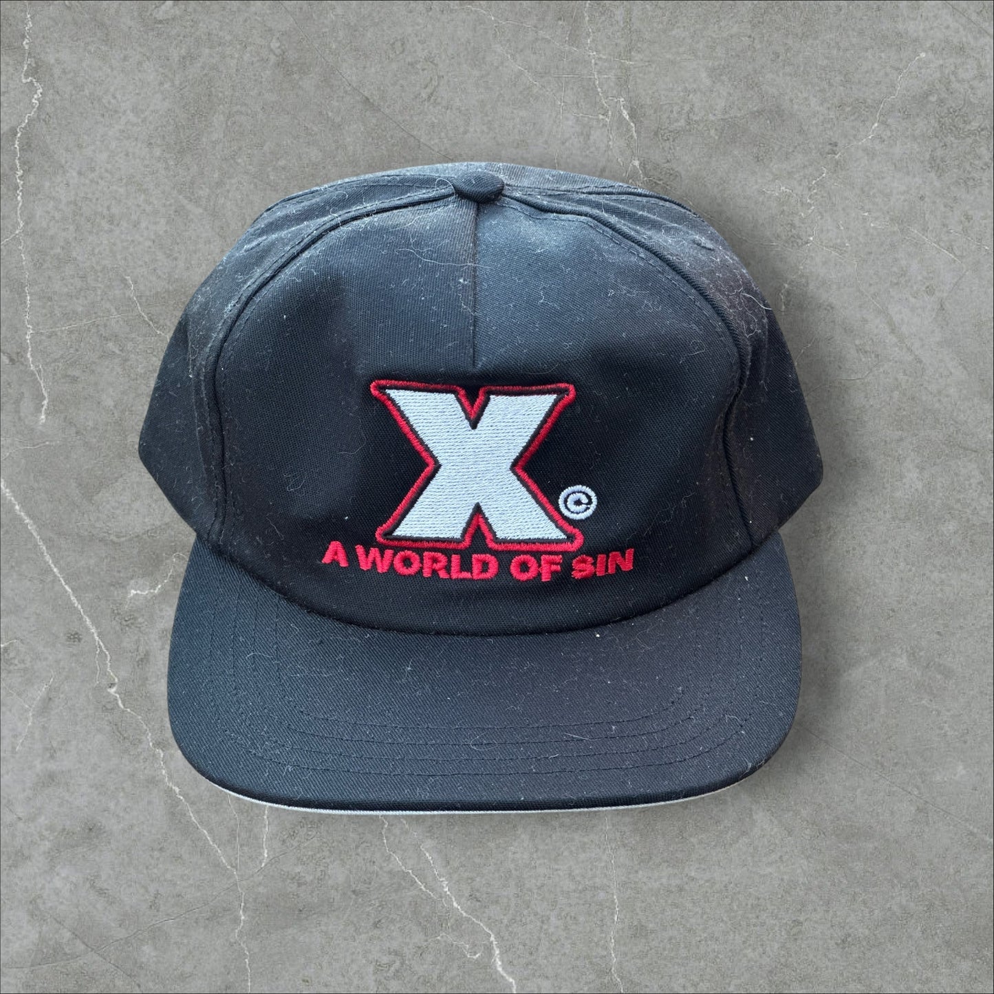 X World Of Sin Hat